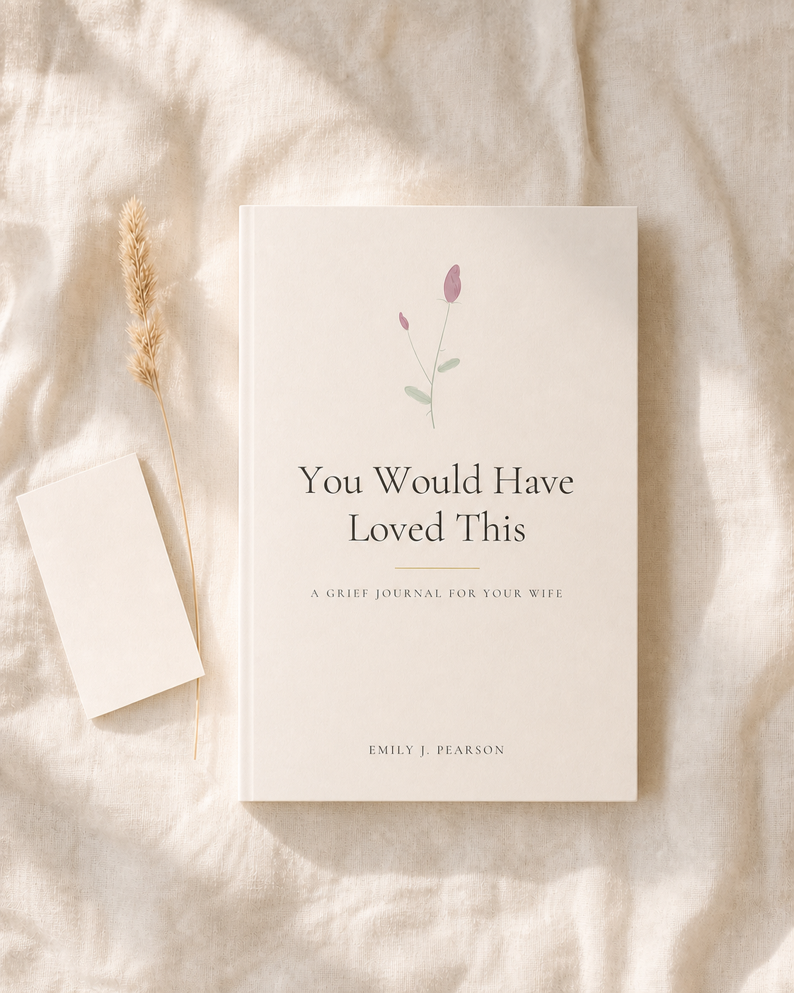 You Would Have Loved This, A Grief Journal for Your Wife, on soft linen beside a blank notecard