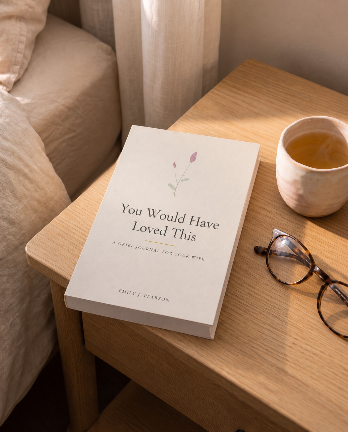 You Would Have Loved This, A Grief Journal for Your Wife, on a bedside table in morning light